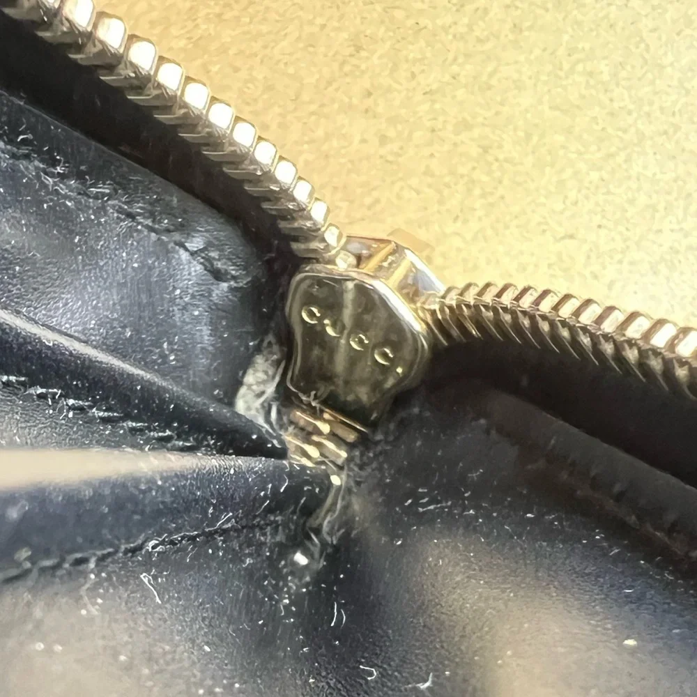Gucci Black Embossed GG Leather Zip Wallet with Gold Tone Accent
